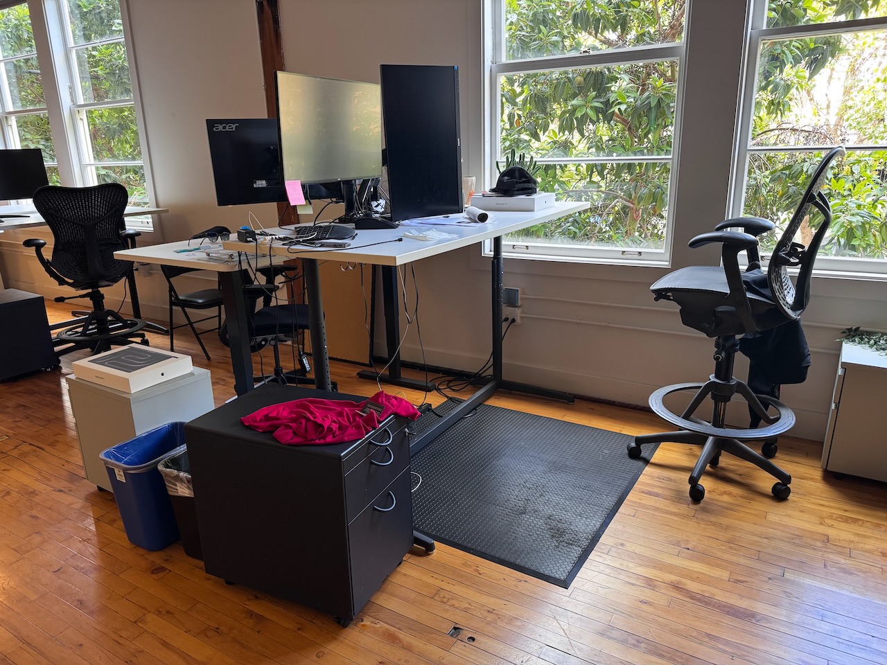 Photo of my boss's desk as one would walk up to it Checking the angle of approach